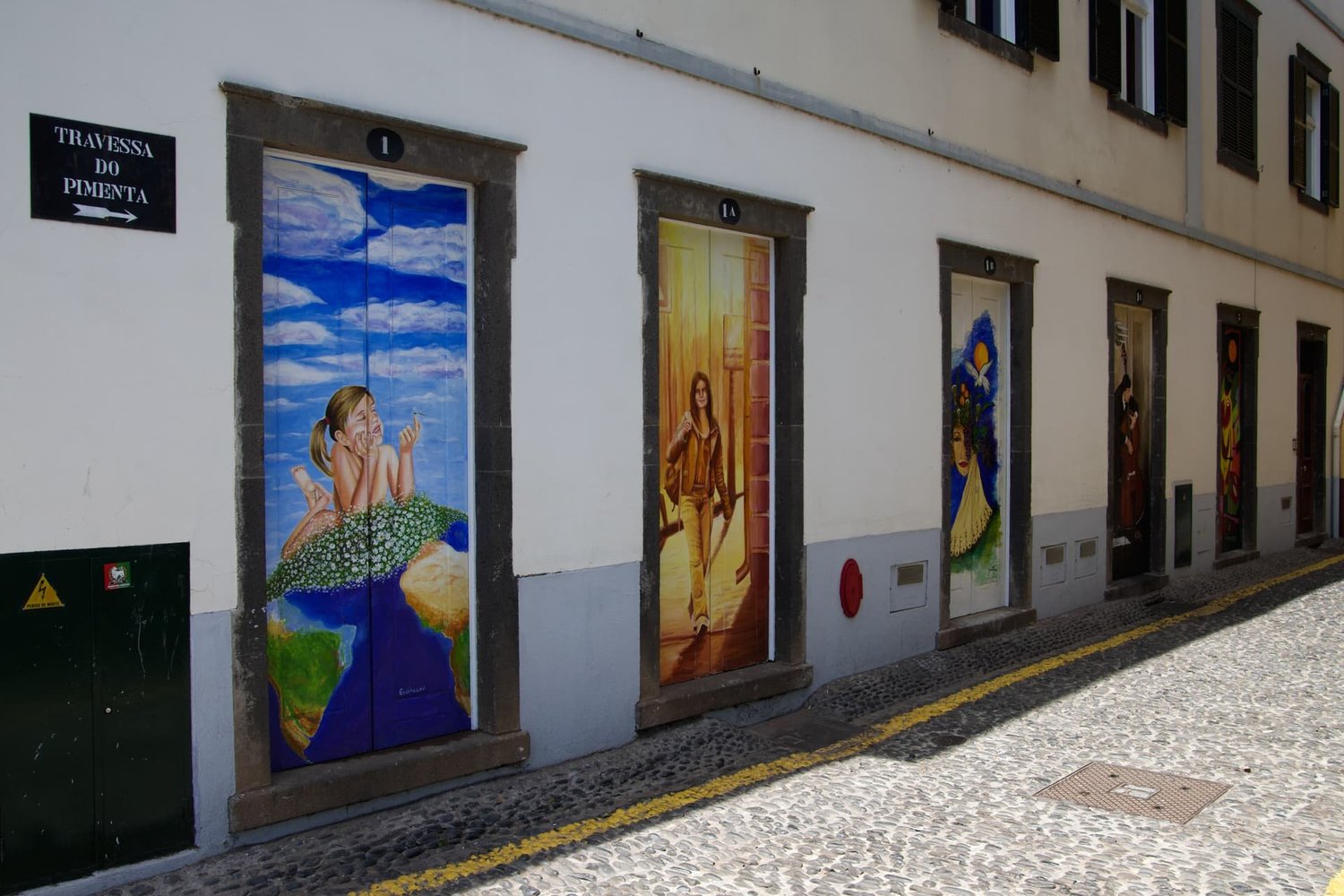 Hand-painted doorways along Rua de Santa Maria in Funchal's Old Town