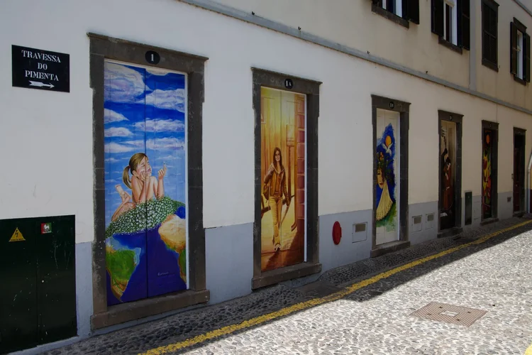 Painted doors on a street in Funchal's Zona Velha