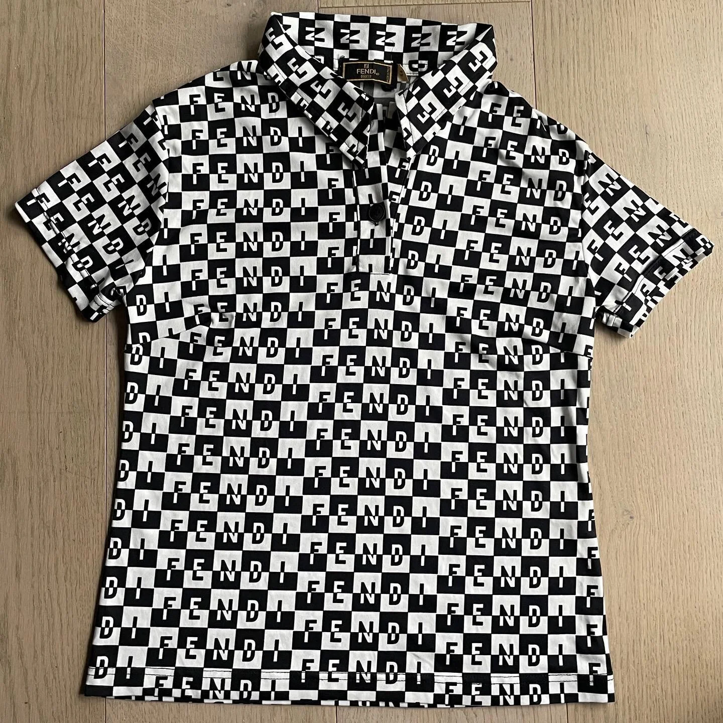 Obsessed with this vintage Fendi top from the 80s 😫 This is the coolest women&rsquo;s Fendi Mare top which is still in like new condition despite its age. The all over black &amp; white Fendi monogram print is so chic and eye catching. Size IT 44 an