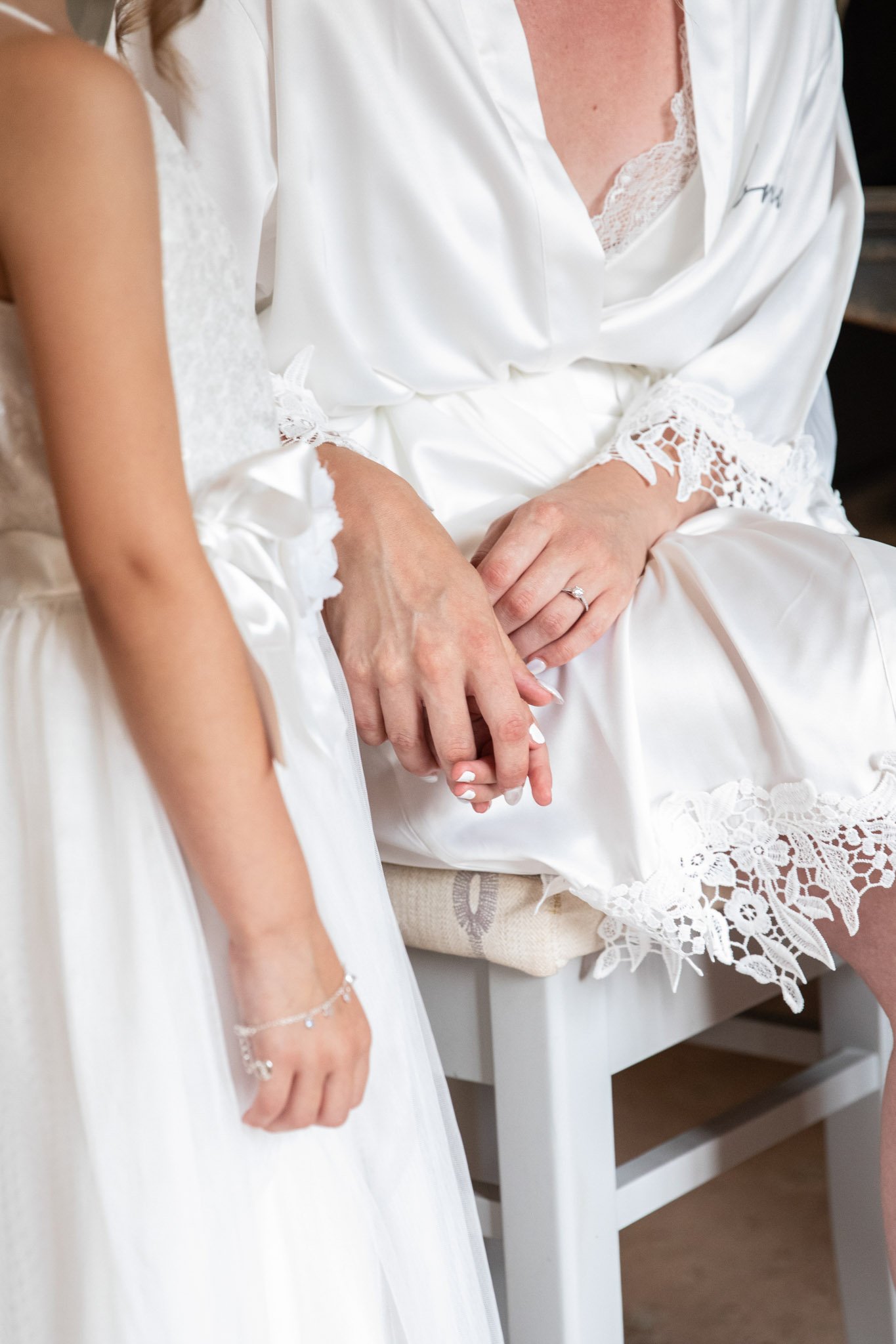 Bride before ceremony, with flower girl