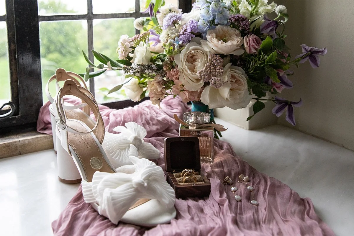 Professional details shot of wedding bouquet, shoes and other accessories