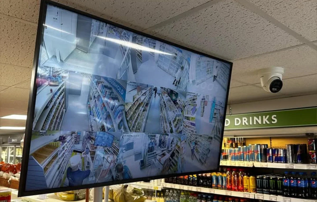 Security camera and CCTV screen in a convenience store
