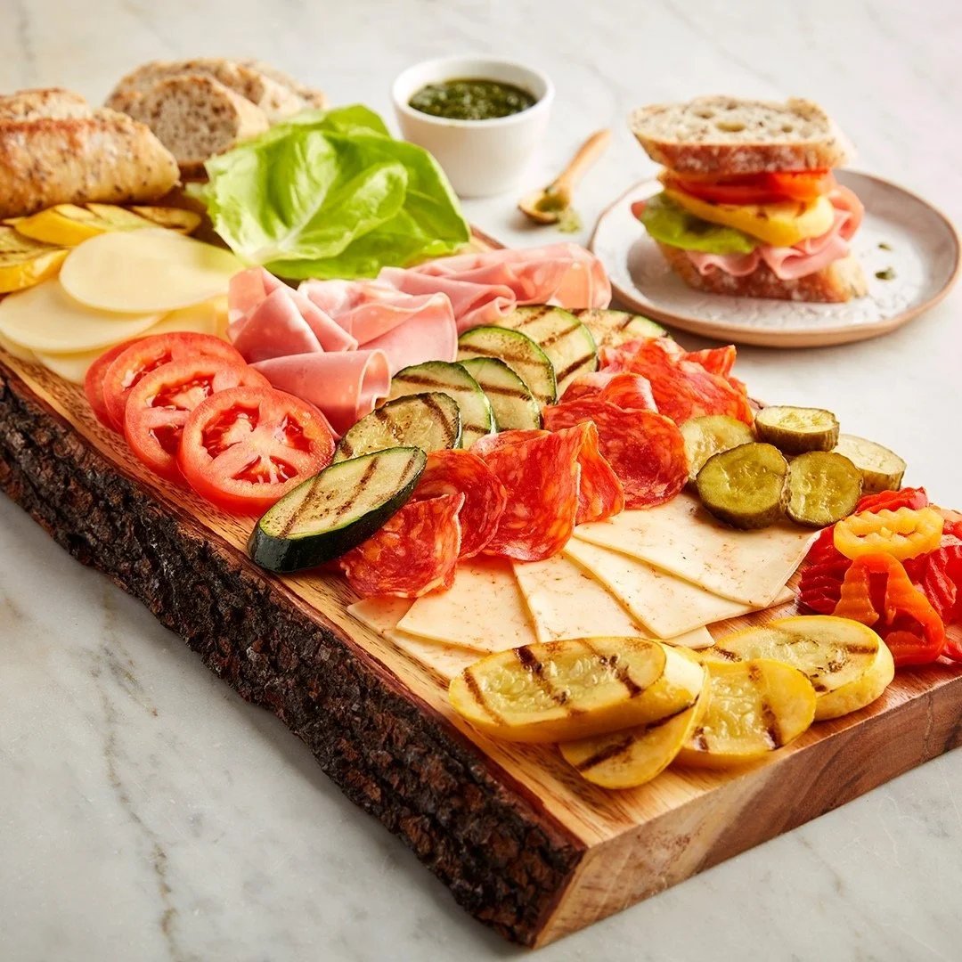 Mastro deli meat diy sandwich board with grilled veggies, cheese, and fresh bread. Perfect for a crowd.