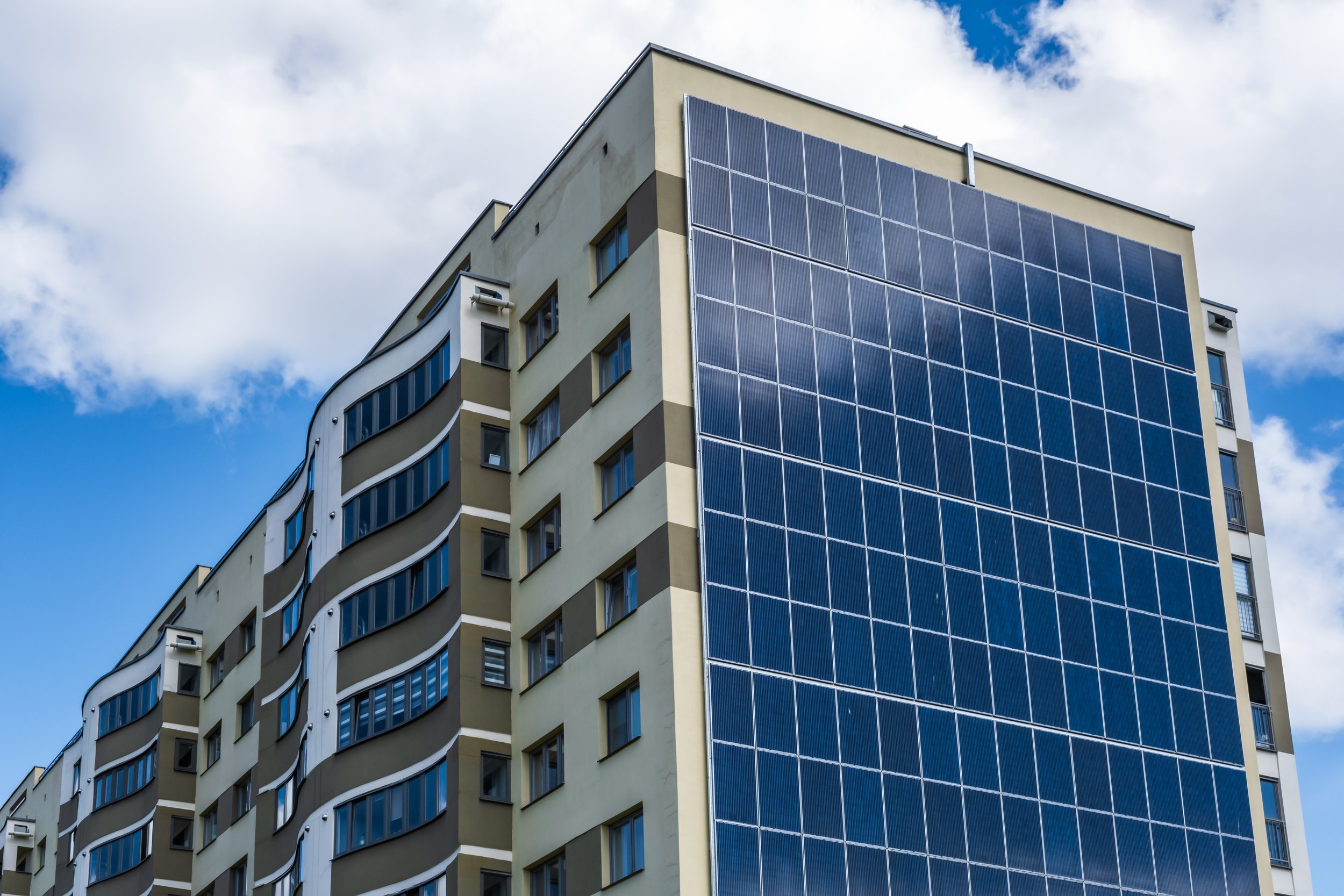 solar-panels-wall-multistorey-building-renewable-solar-energy.jpg