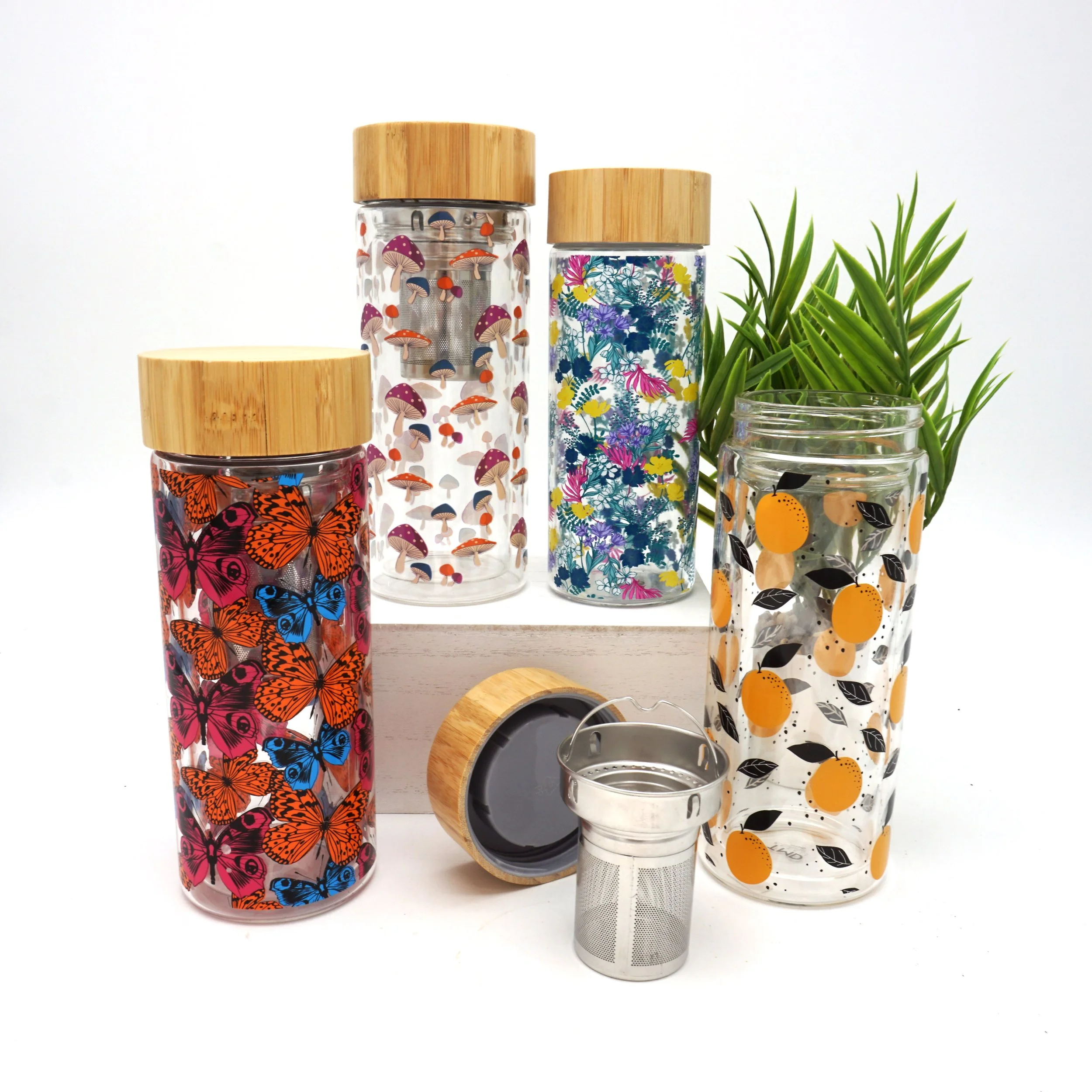 Glass_bottles_bamboo_lids_styled.jpg