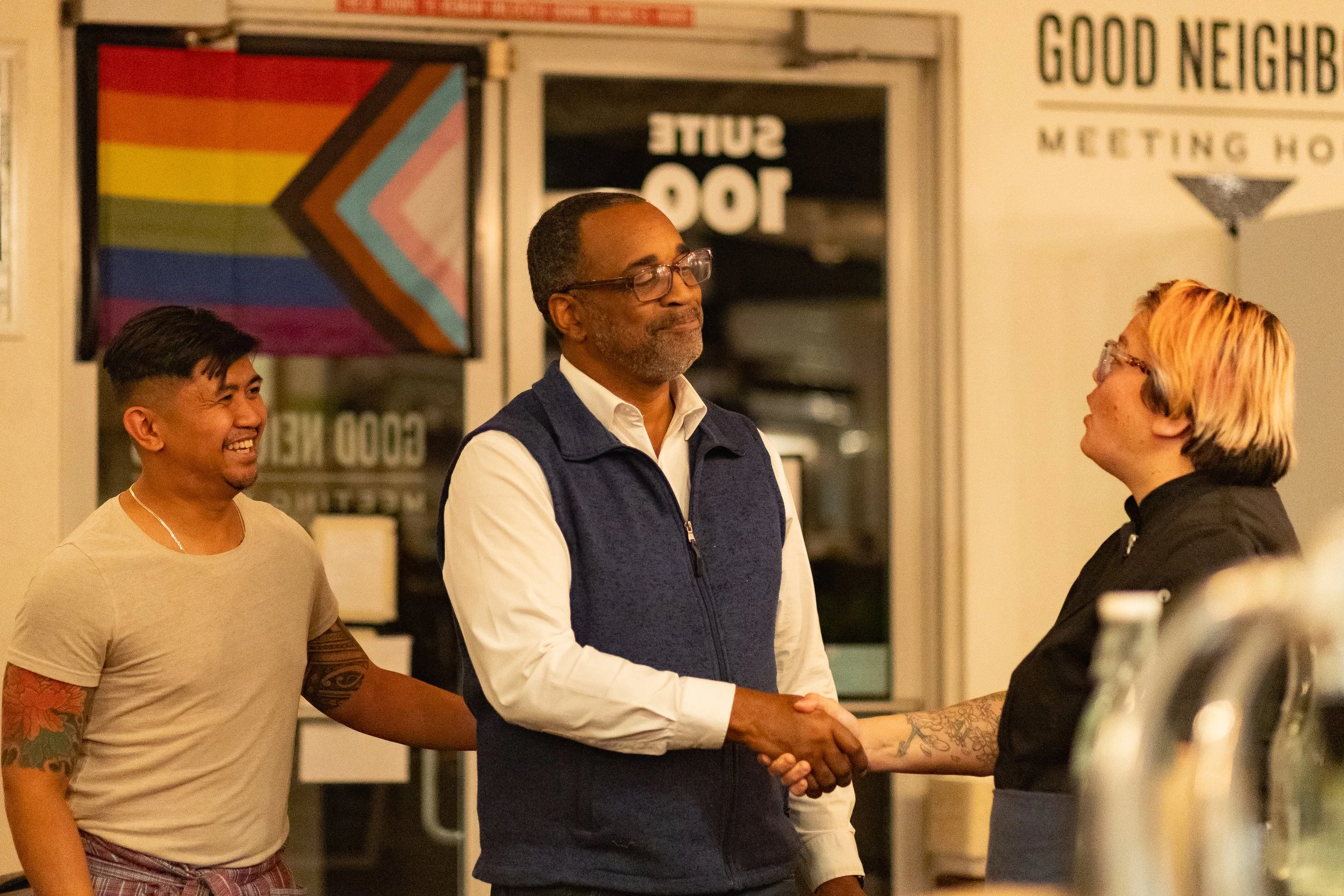 Chef Katie and Gene greeting a guest