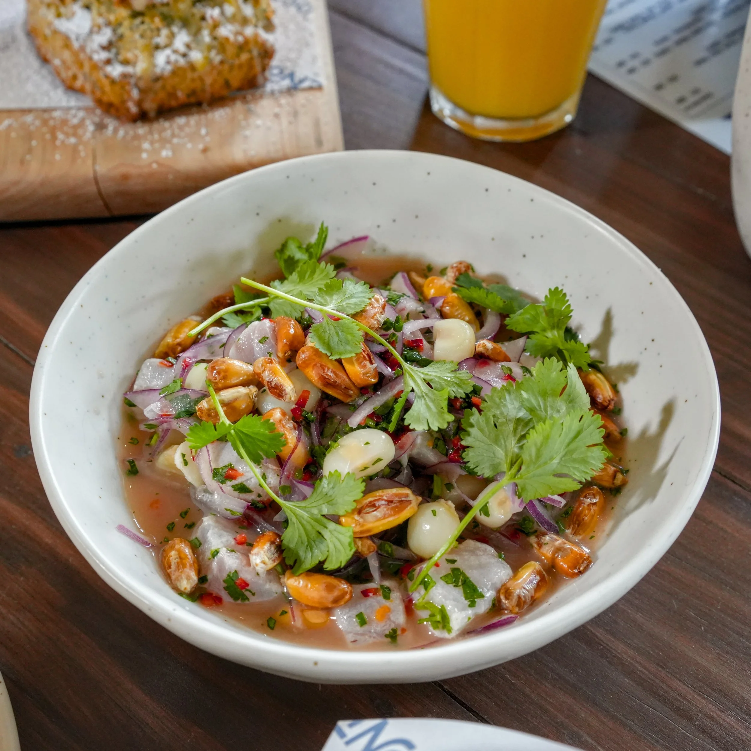🐟 Hot days call for cold fish 🐟 

Our fresh catch ceviche is served with sweet potato, red onion, Fresno chili, cilantro, and two different types of Peruvian corn 🌽 

We recommend ordering a side of yucca fries to dip in the ceviche broth 😇

(Pho
