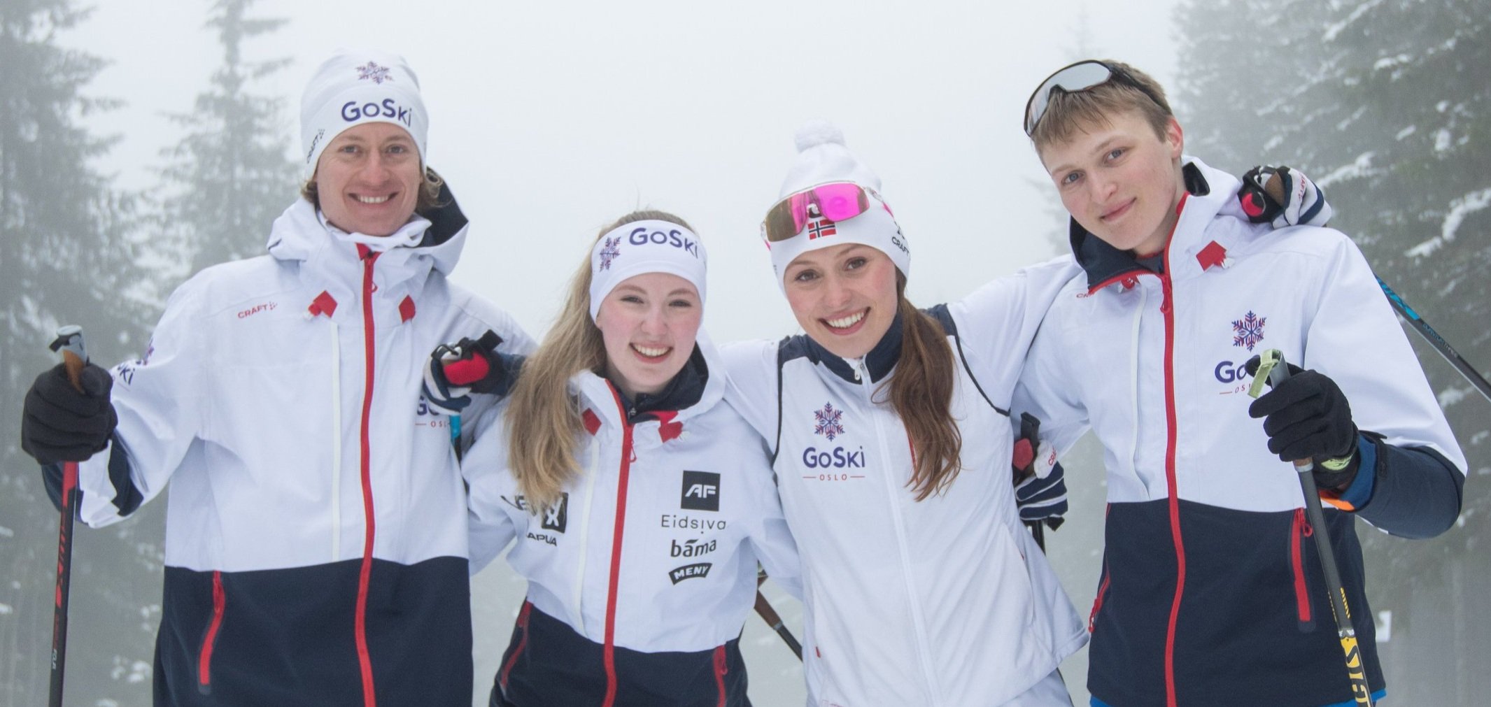 Instructors stand together, all in company clothes "GoSki Oslo"