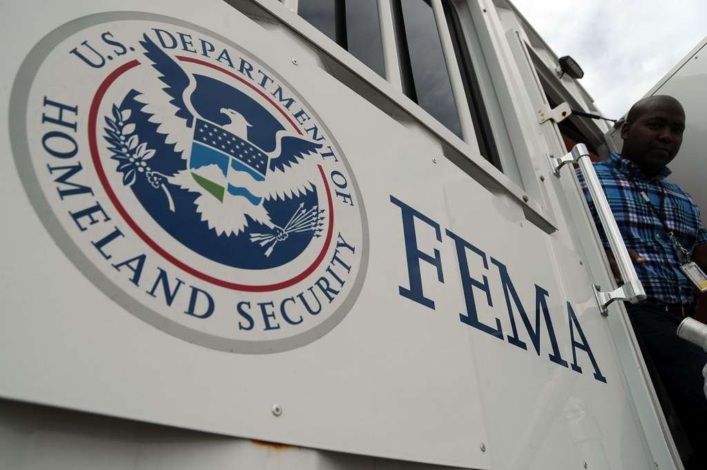 a-member-of-fema-exits-a-mobile-operations-center-at-3be7f7-1024.jpg