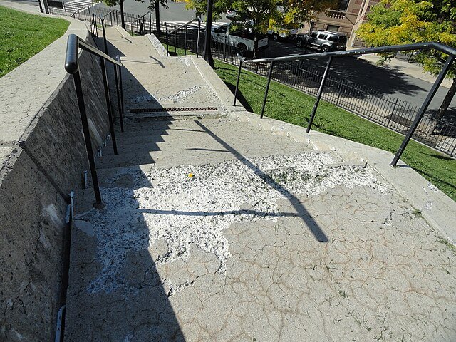 Concrete_Deterioration_at_Northwest_Stair_at_Dorchester_Heights_(d8956e3d-c980-4c69-beed-5cd788ae1dab).JPG