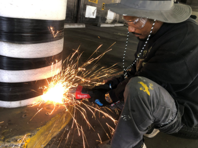 Metal Fabrication with PFS. Fixing bumpers on a Parking Garage structure.