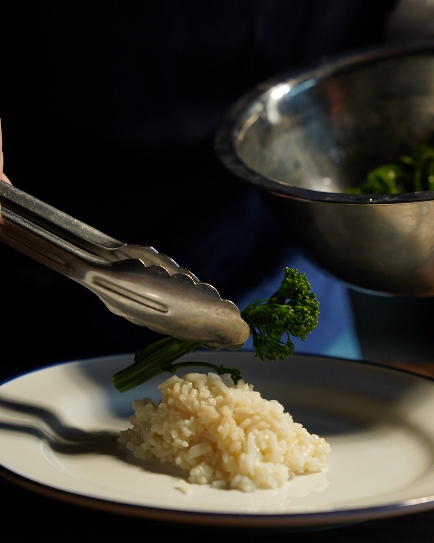 Chef Stavros&rsquo; favorite part &mdash; plating! 
📸: Chilean Sea Bass served with Greek rice and broccolini