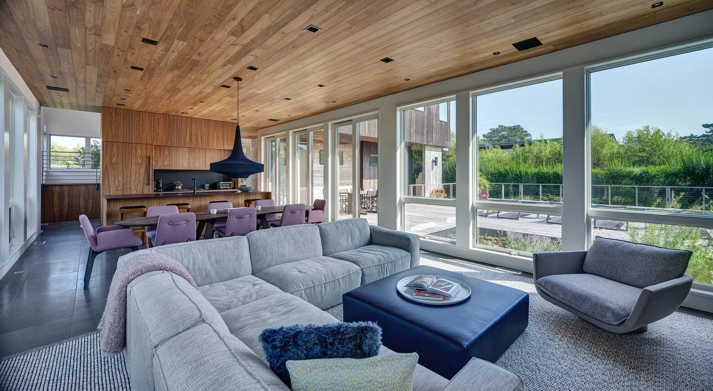 A view of the #interior of our Juniper House. The #shousugiban siding and dark swimming pool outside translate to rich basalt floors and walnut ceiling and millwork inside. 
Siding and ceiling cladding - @resawntimberco 
📸 @carbone 
#beachhouse #m