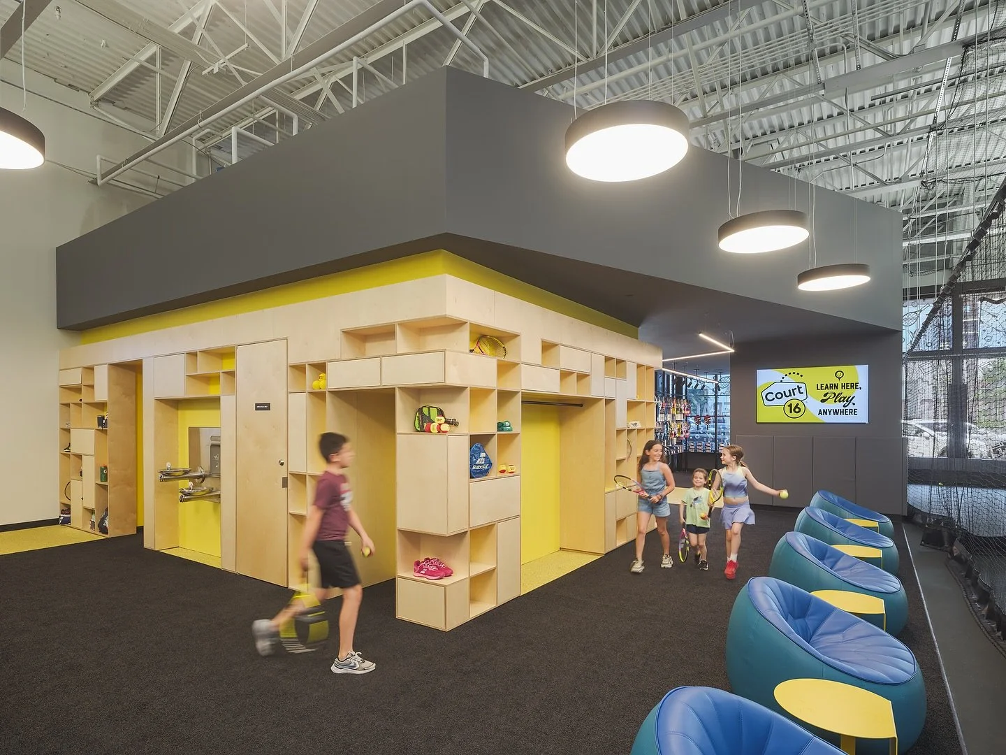 A playful but functional geometric entry structure serves as a building within a building, consolidating key program elements into a distinct architectural form at our 5th club designed for @court16tennis 

📸 @samoberter 
Build @_patriotconstruction
