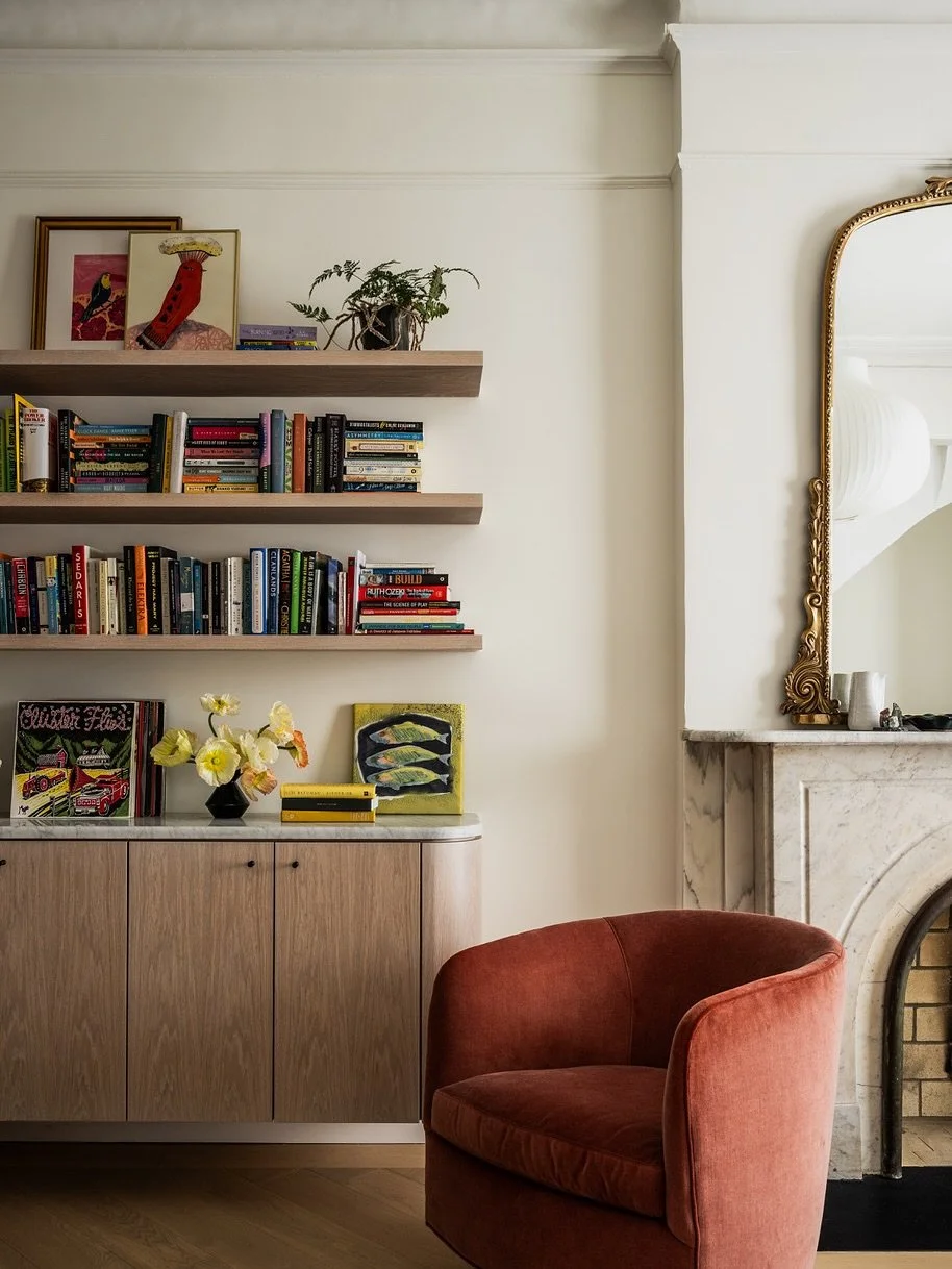 As seen in @brownstoner the parlor of our Cobble Hill #brownstonerenovation features modern millwork whose arches and subtle curves pay subtle homage to the original classic details without replicating them. 

Photography - @atanz 
Styling - @miraevn