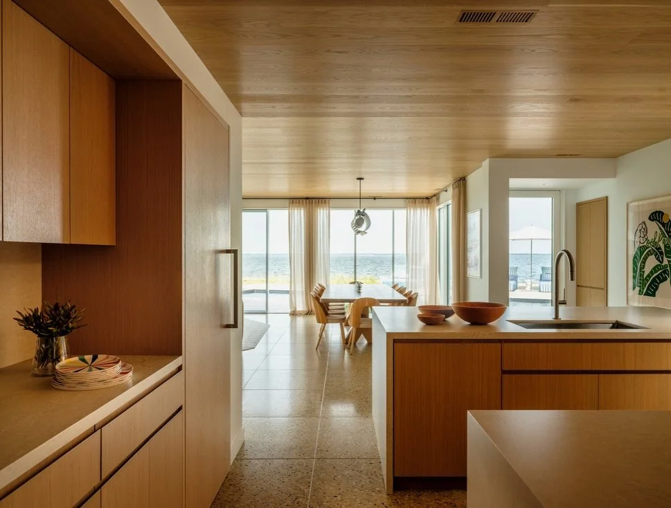 Inside our Duneway #fireisland renovation we replaced the ceilings and floors for better resiliency and character. The terrazzo floors will handle wet pool feet and evoke the nearby sand, and the wood ceilings and millwork provide the casual warmth a