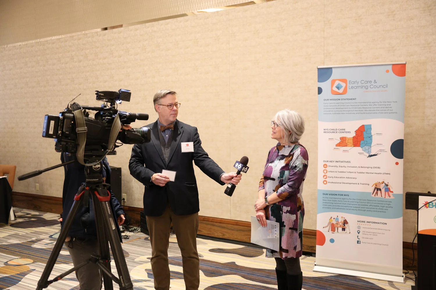 Business event interview being filmed professionally