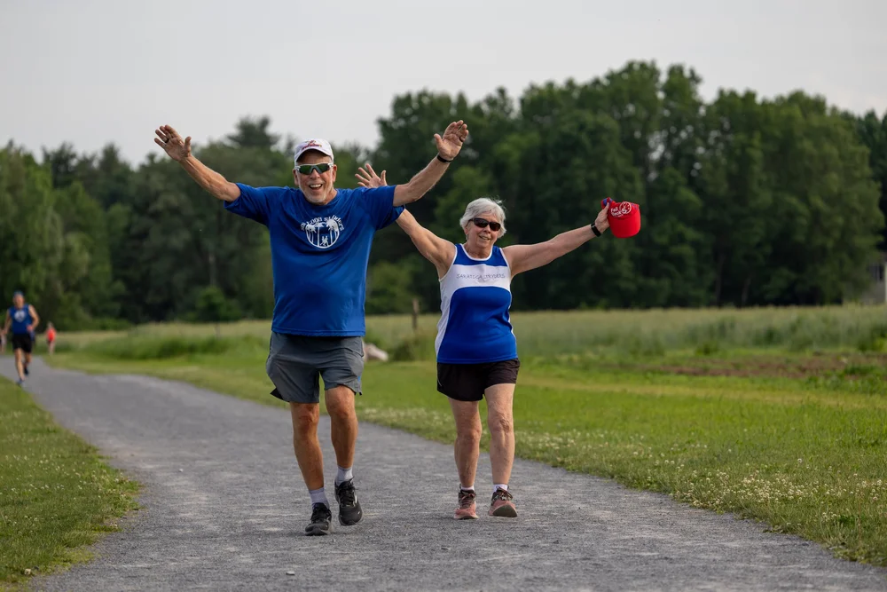 Participants celebrating during a community running event