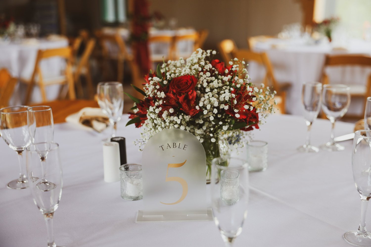 Red rose wedding table arrangement