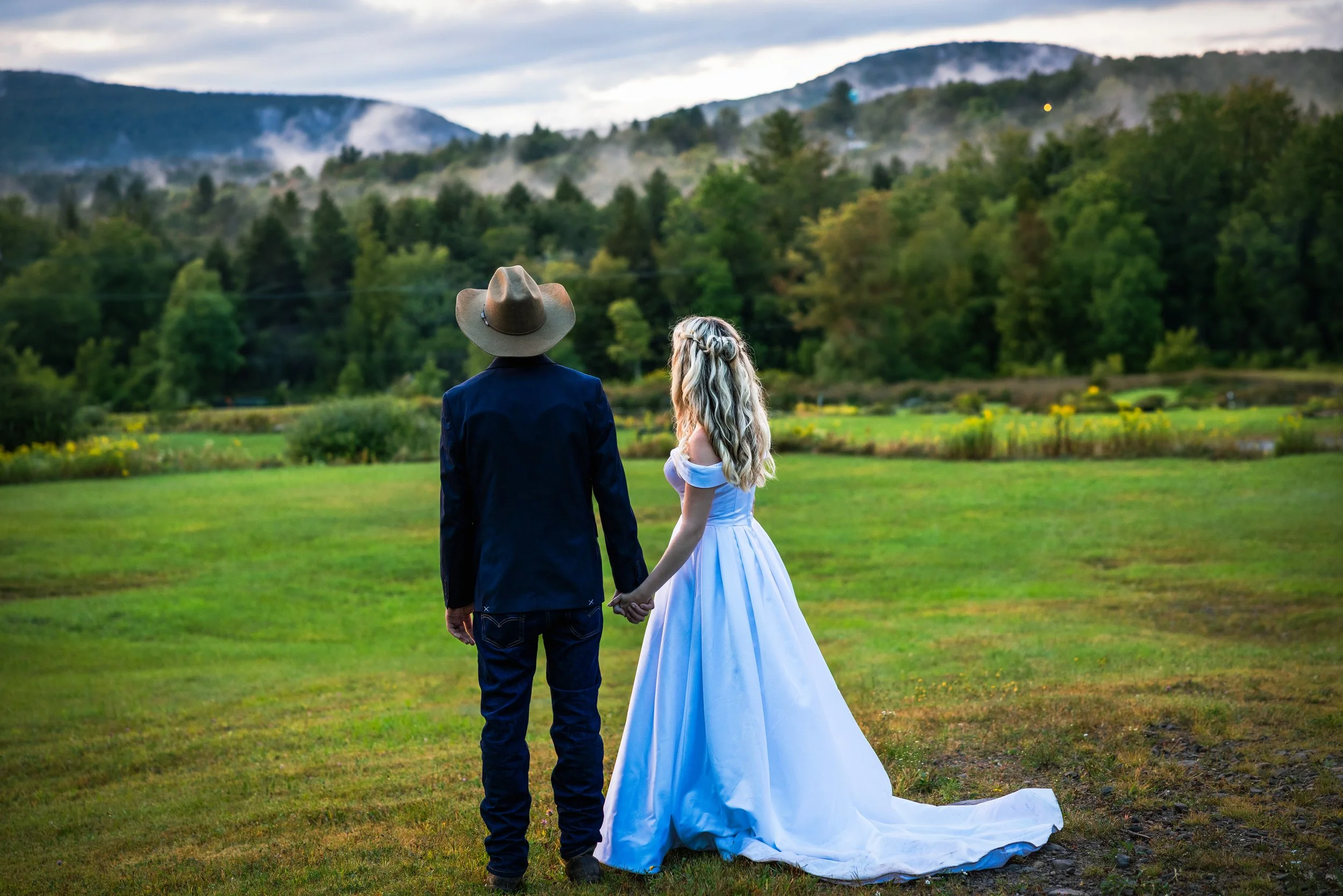 Bride and groom overlooking Adirondack mountains