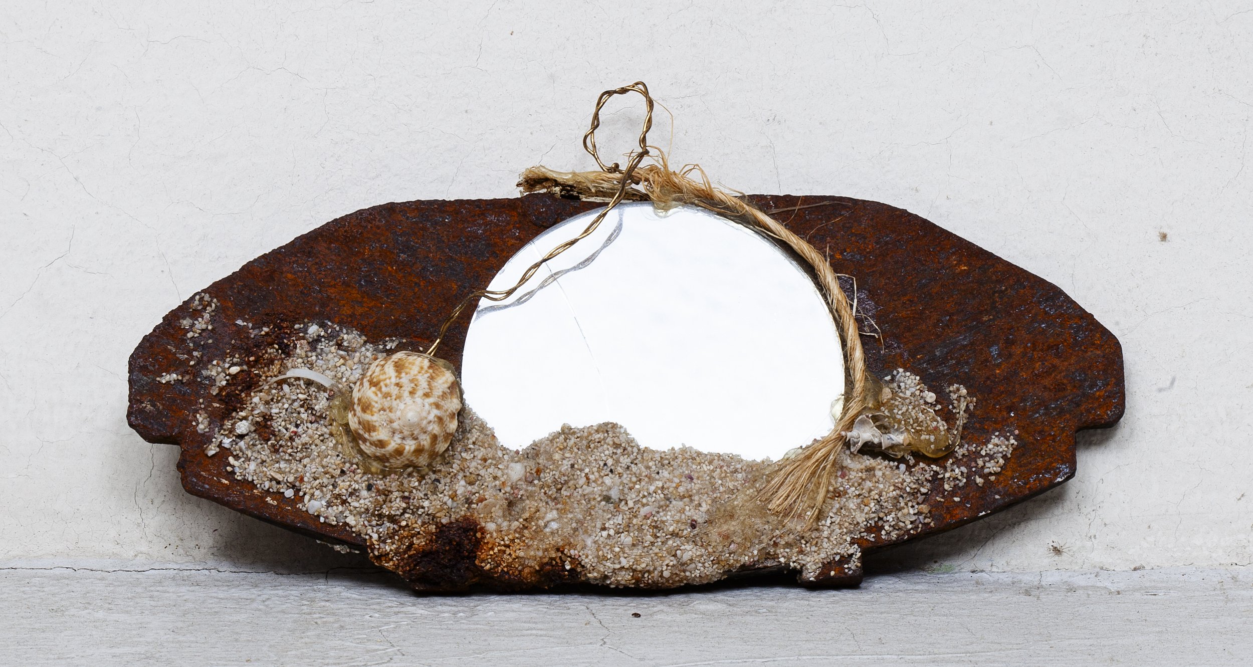 Beach Mirror, 2012.
Mixed media collage with mirror and shells, 3"H x 7" W.
