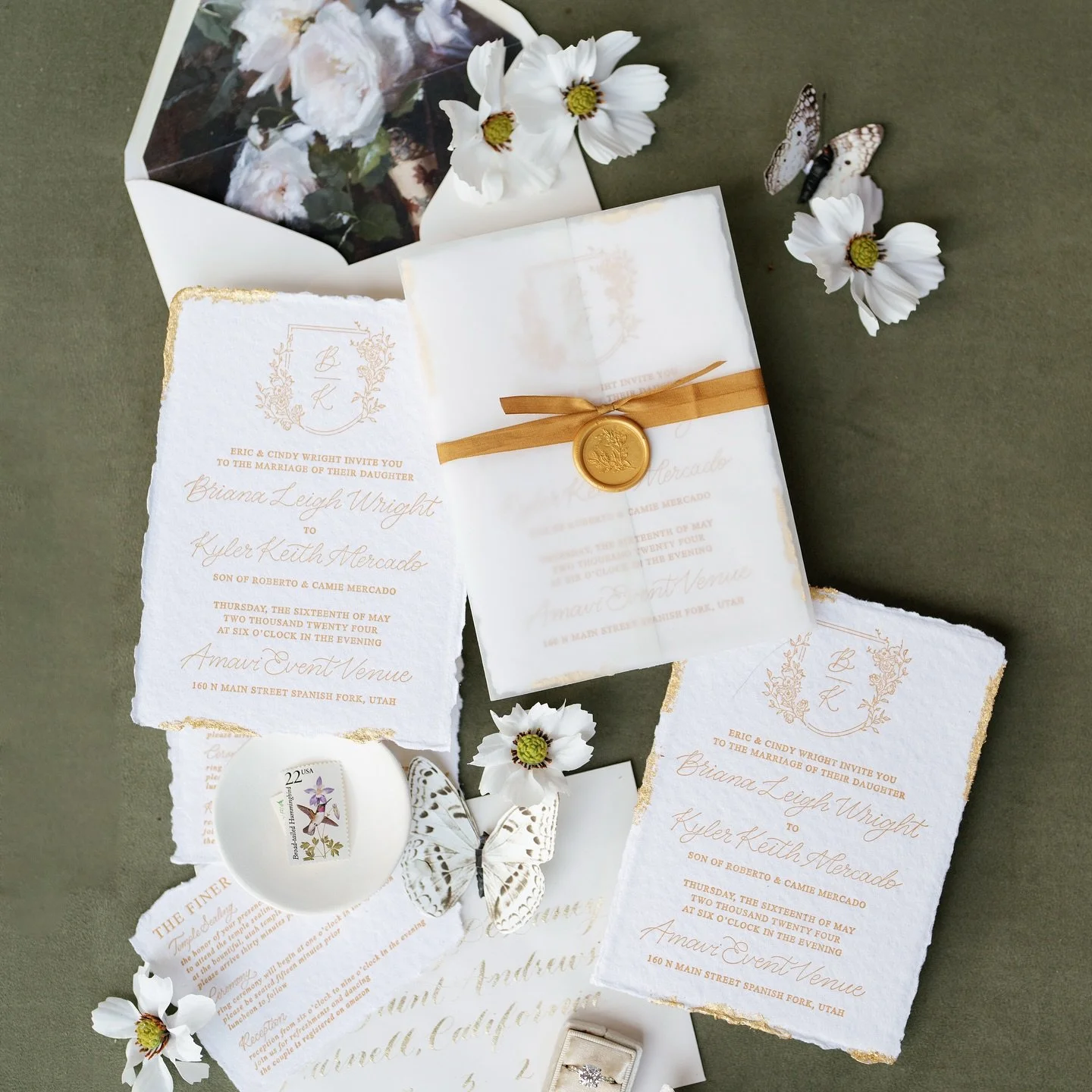 B&amp;K&rsquo;s vintage gold invitation suite🕊️

Handmade deckle edge paper
Letterpress
Handwritten calligraphy 
Silk ribbon
Vintage envelope liner
Vellum wrap
Wax seals
Vintage postage 

Styled by @oliveandoakmat 

#letterpress #stationery #wedding