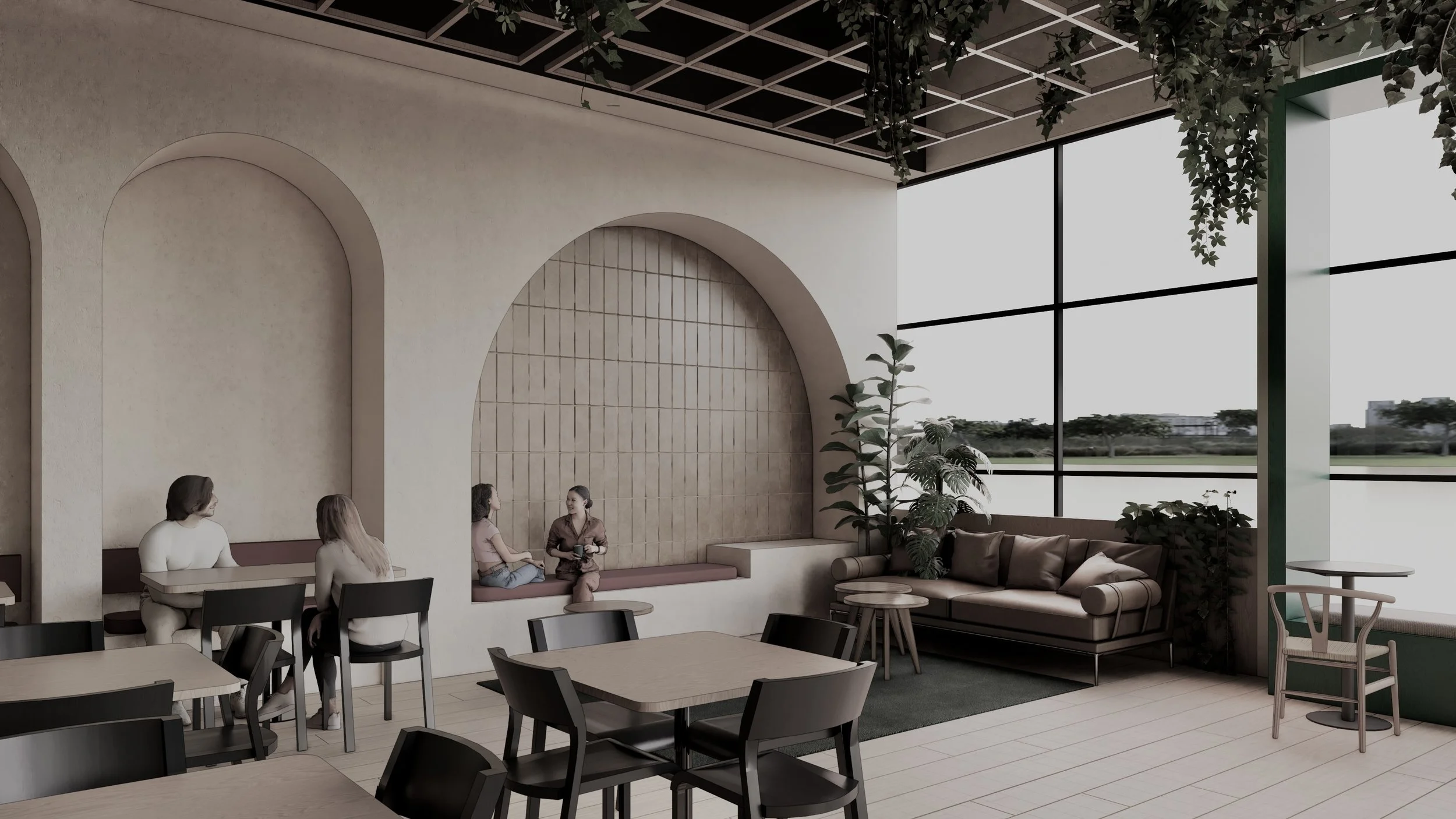 Modern cafe interior with large window, seating area with four women having a conversation, a beige sofa, potted plants, and minimalist decor.