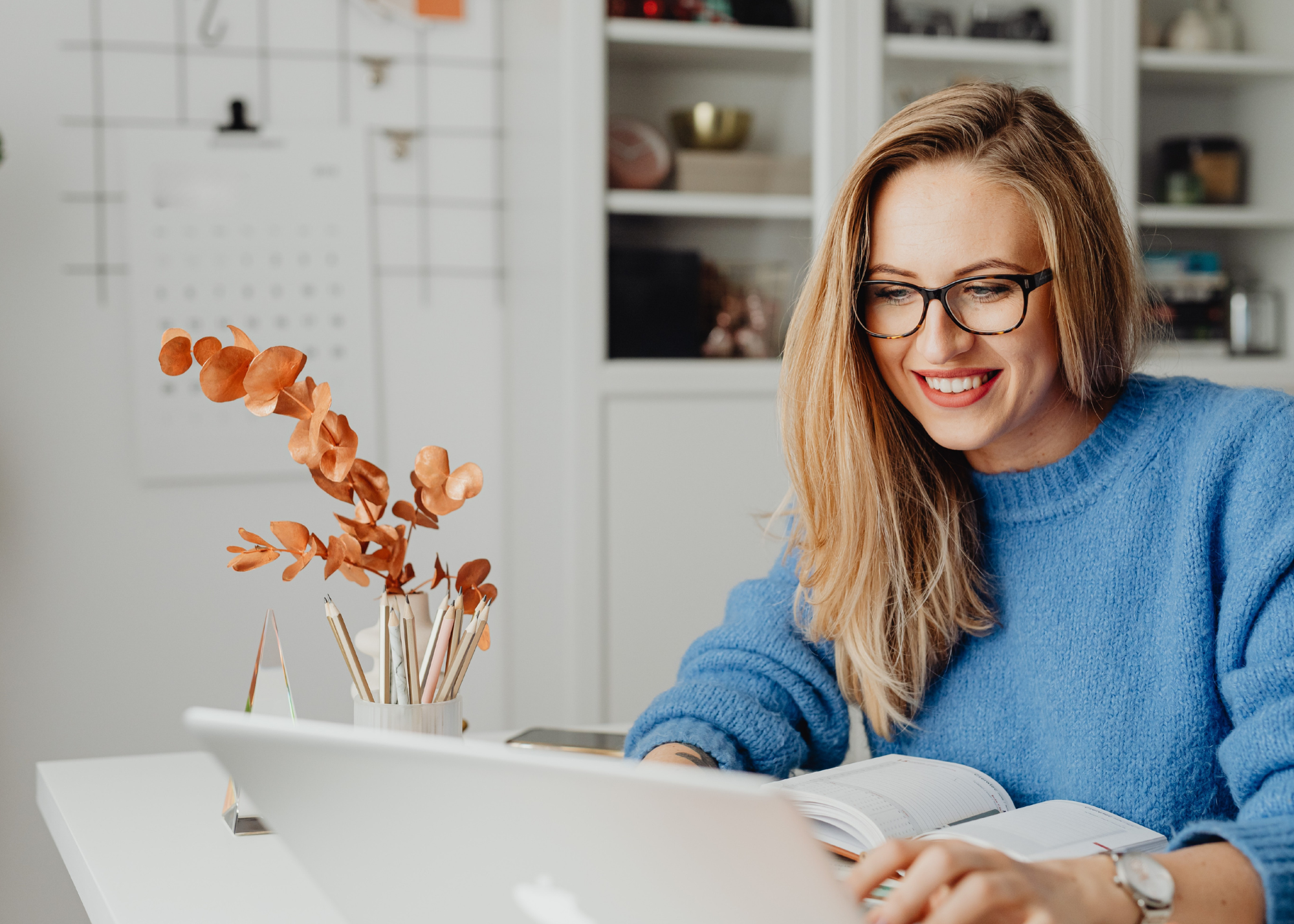 women executive leader doing homework from coach to plan successful career and life strategy