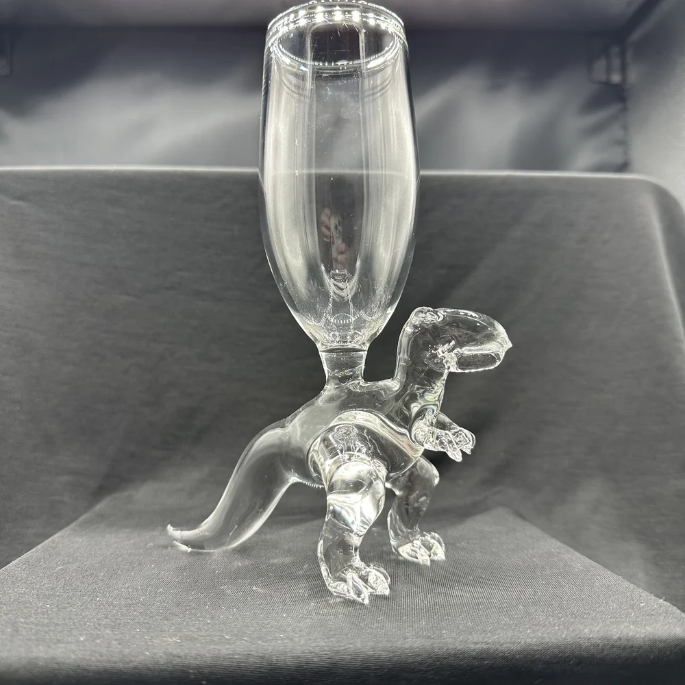 Handblown dinosaur champagne glasses available now!  David White Glass.