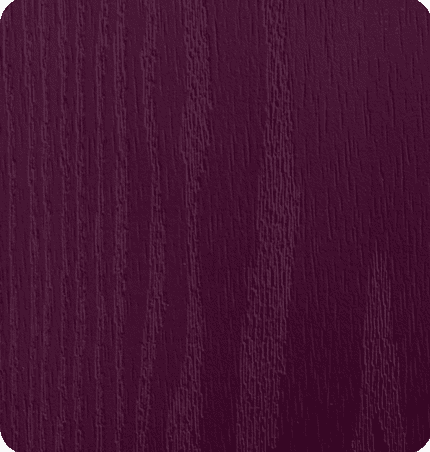 Close-up of a purple wooden surface with visible grain and texture.