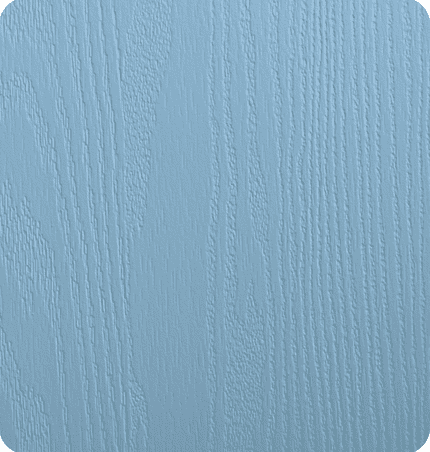 Close-up of a light blue textured wooden surface.