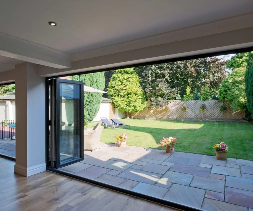 aluminium bi-folds opening out onto garden