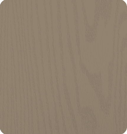 Close-up of a light-colored wooden surface with visible wood grain.