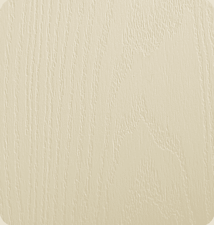 Close-up of a textured, light beige wooden surface.