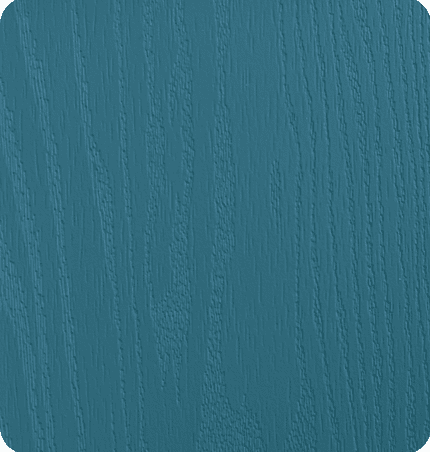 Close-up of a blue wooden surface with visible wood grain texture.