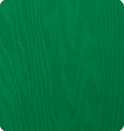 Close-up of a green wooden surface with visible wood grain.