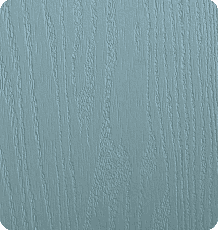Close-up of a textured, light blue surface resembling wood grain.