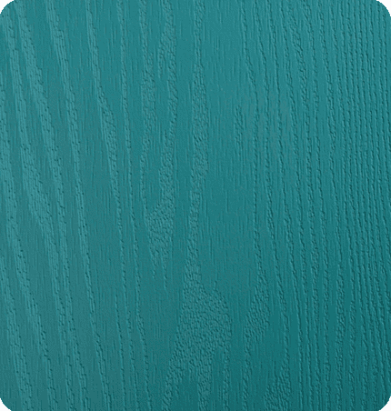 Close-up of teal-colored wooden surface with visible grain texture