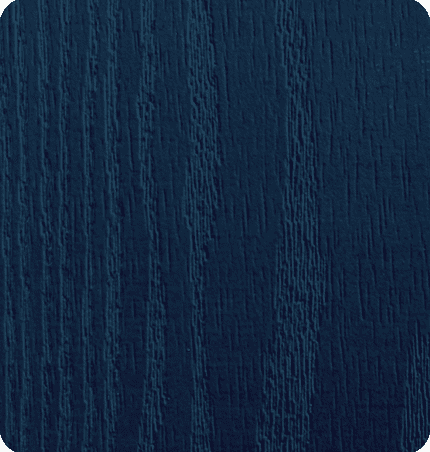 Close-up of a dark blue wooden surface with visible grain texture.