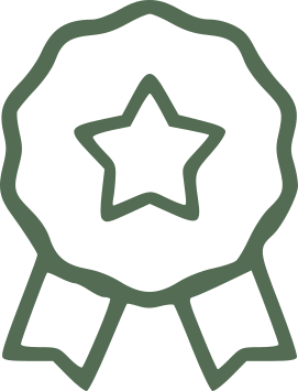 An award ribbon with a star in the center and two hanging ribbons below.