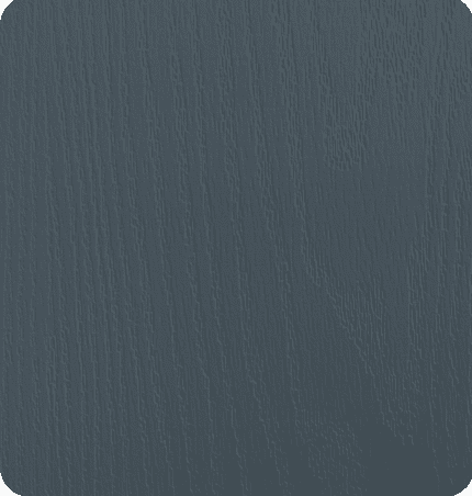 Close-up of a textured dark-colored surface, possibly wood or fabric.