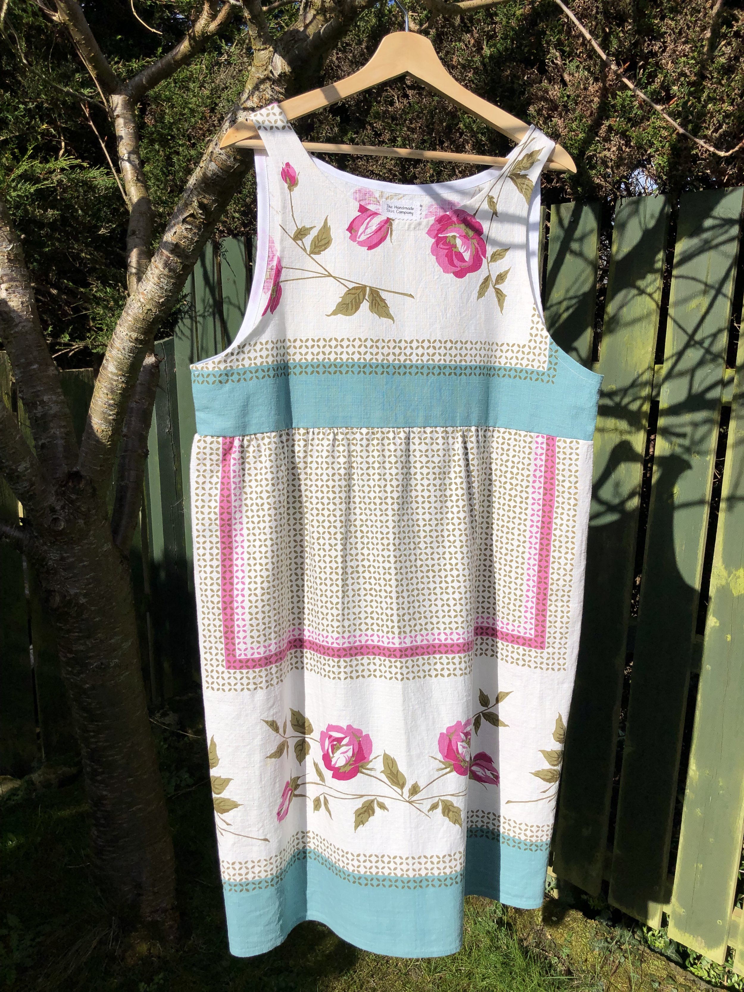 Repurposed vintage tablecloth dress, roses. A bespoke dress which has been handmade from a repurposed vintage tablecloth with a beautiful rose and geometric pattern.