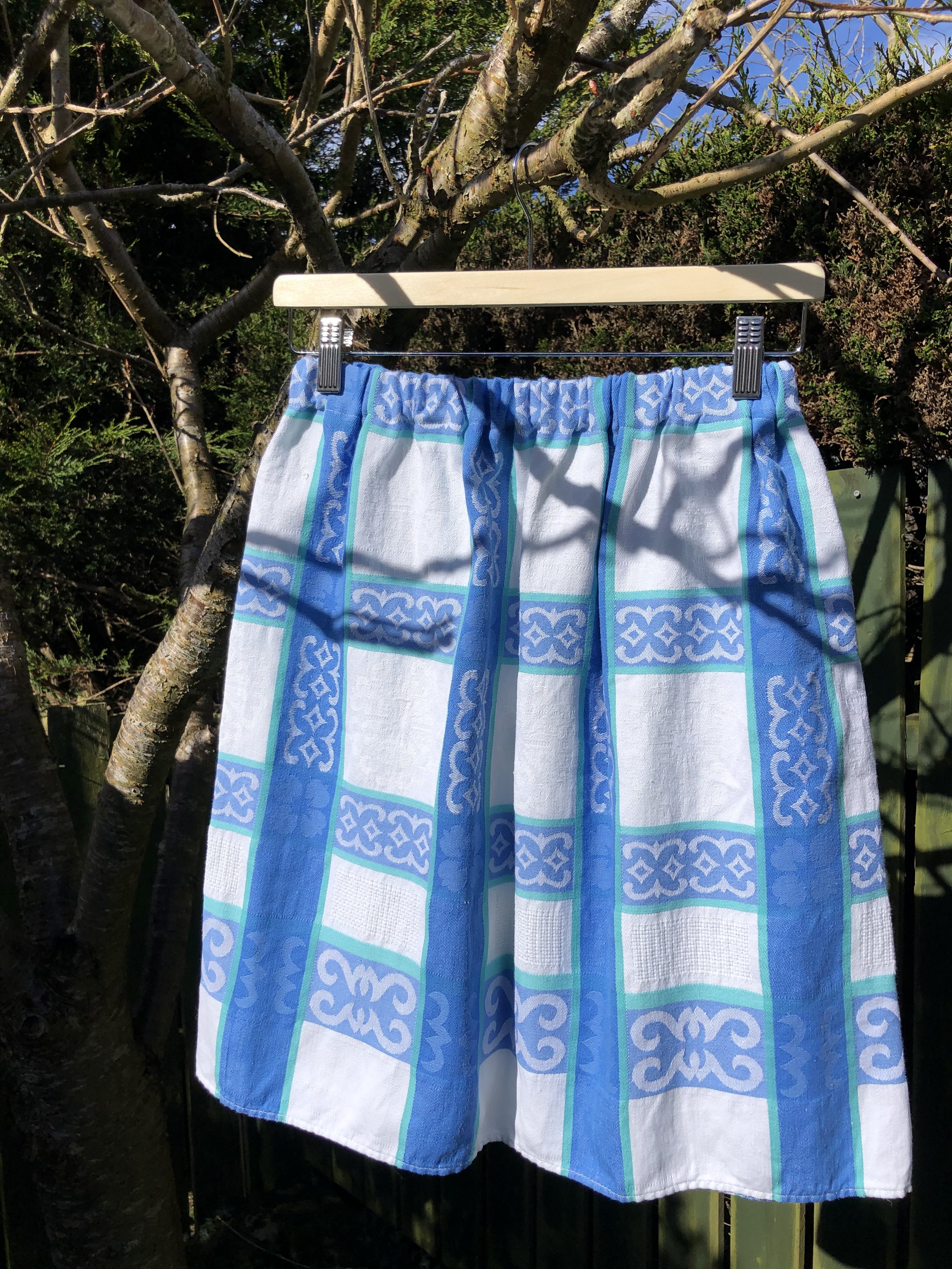 Repurposed vintage tablecloth skirt, blue and white checked. A bespoke skirt which has been handmade from a repurposed vintage tablecloth with a blue and white checked pattern.