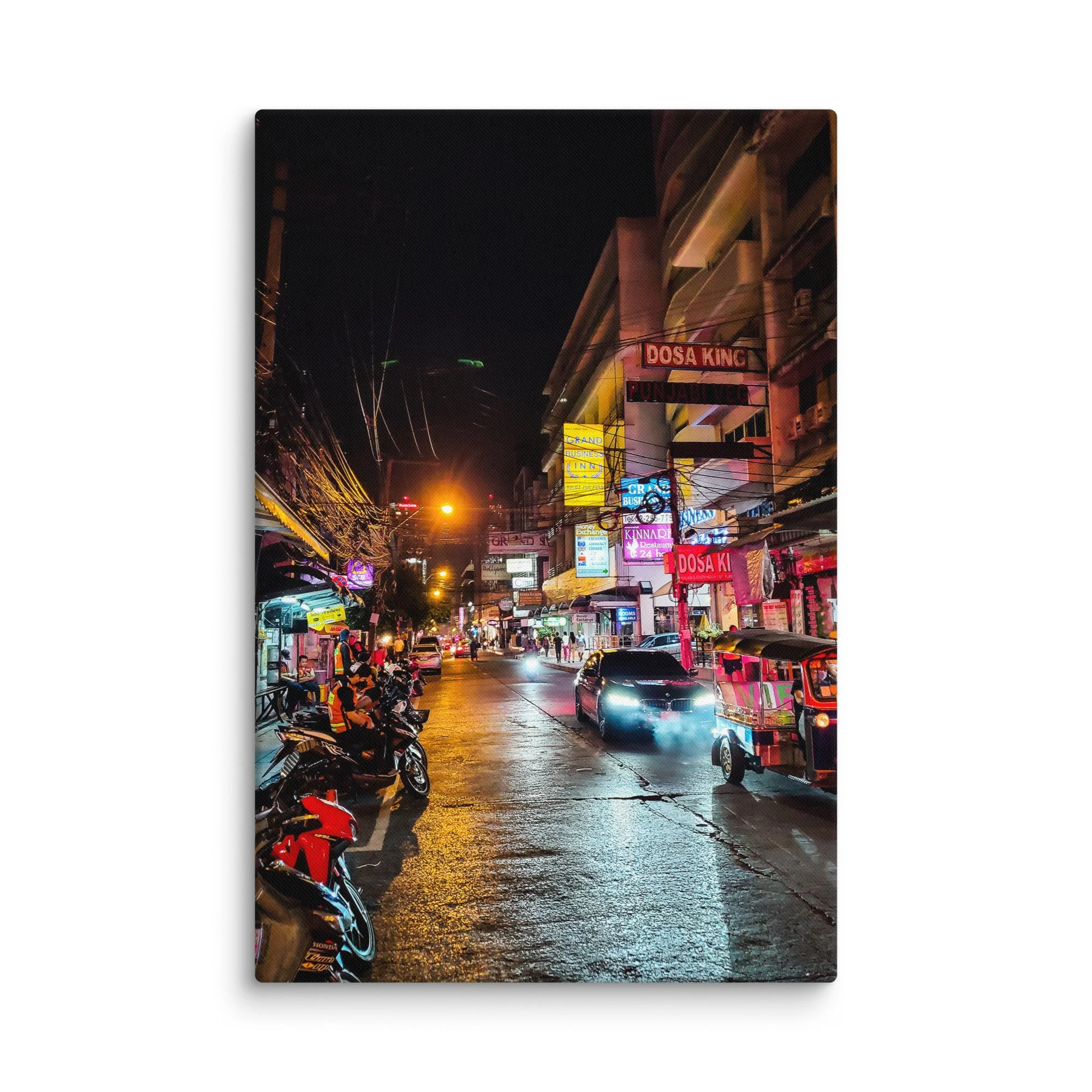 Vibrant Bangkok nighttime street with neon signs, tuk-tuks, scooters and wet road reflections – Thailand urban travel photography canvas print wall art decor