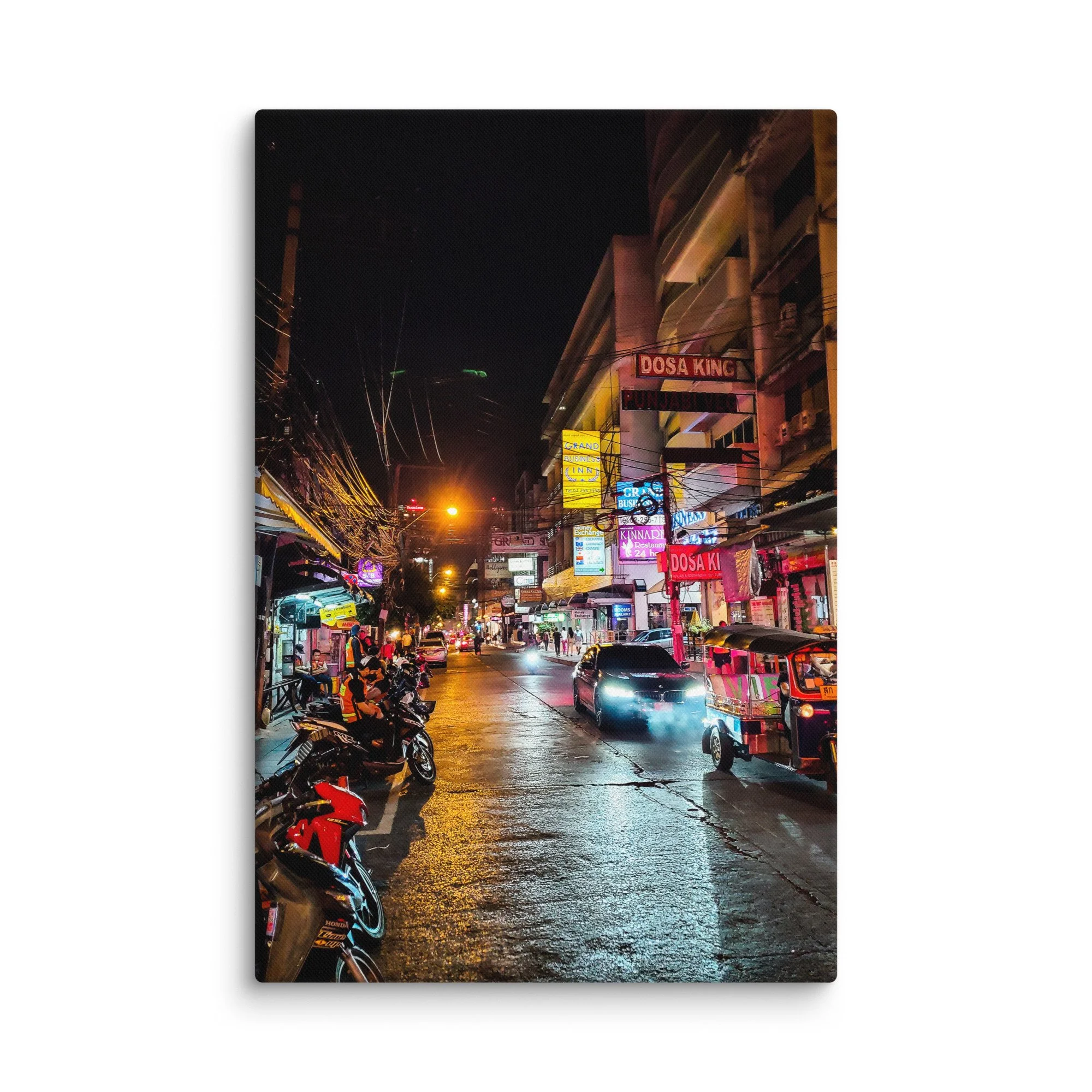 Vibrant Bangkok nighttime street with neon signs, tuk-tuks, scooters and wet road reflections – Thailand urban travel photography canvas print wall art decor