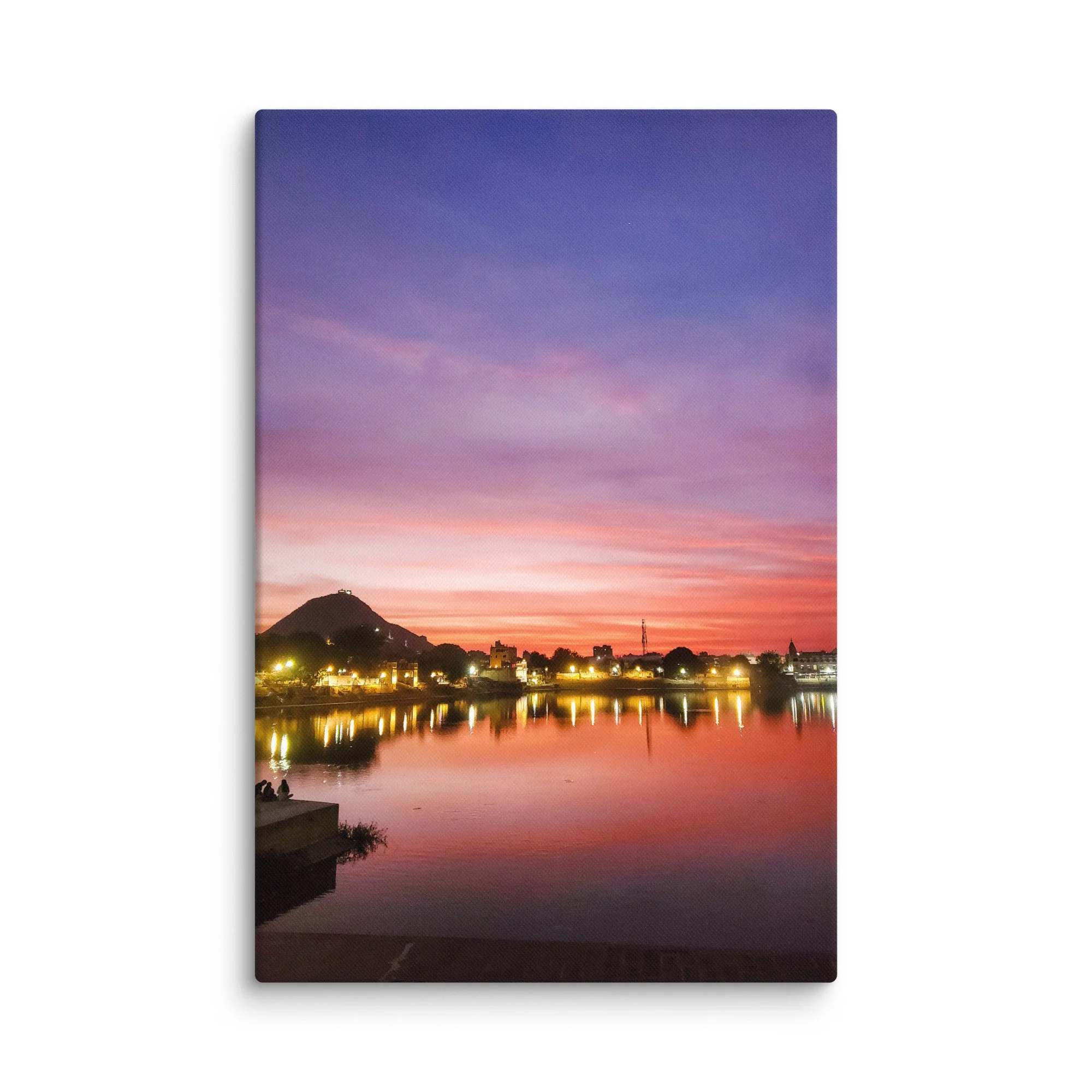 Serene sunset over Pushkar Lake with reflected colorful skies, hilltop temple and peaceful ghats – sacred Rajasthan India travel photography canvas print wall art decor
