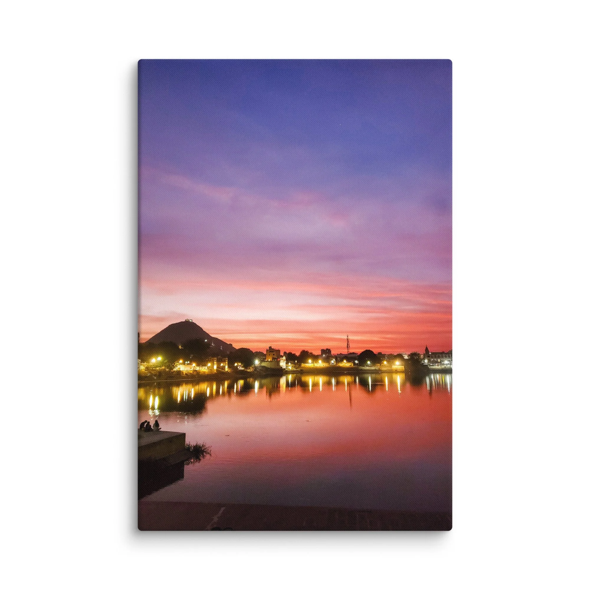 Serene sunset over Pushkar Lake with reflected colorful skies, hilltop temple and peaceful ghats – sacred Rajasthan India travel photography canvas print wall art decor