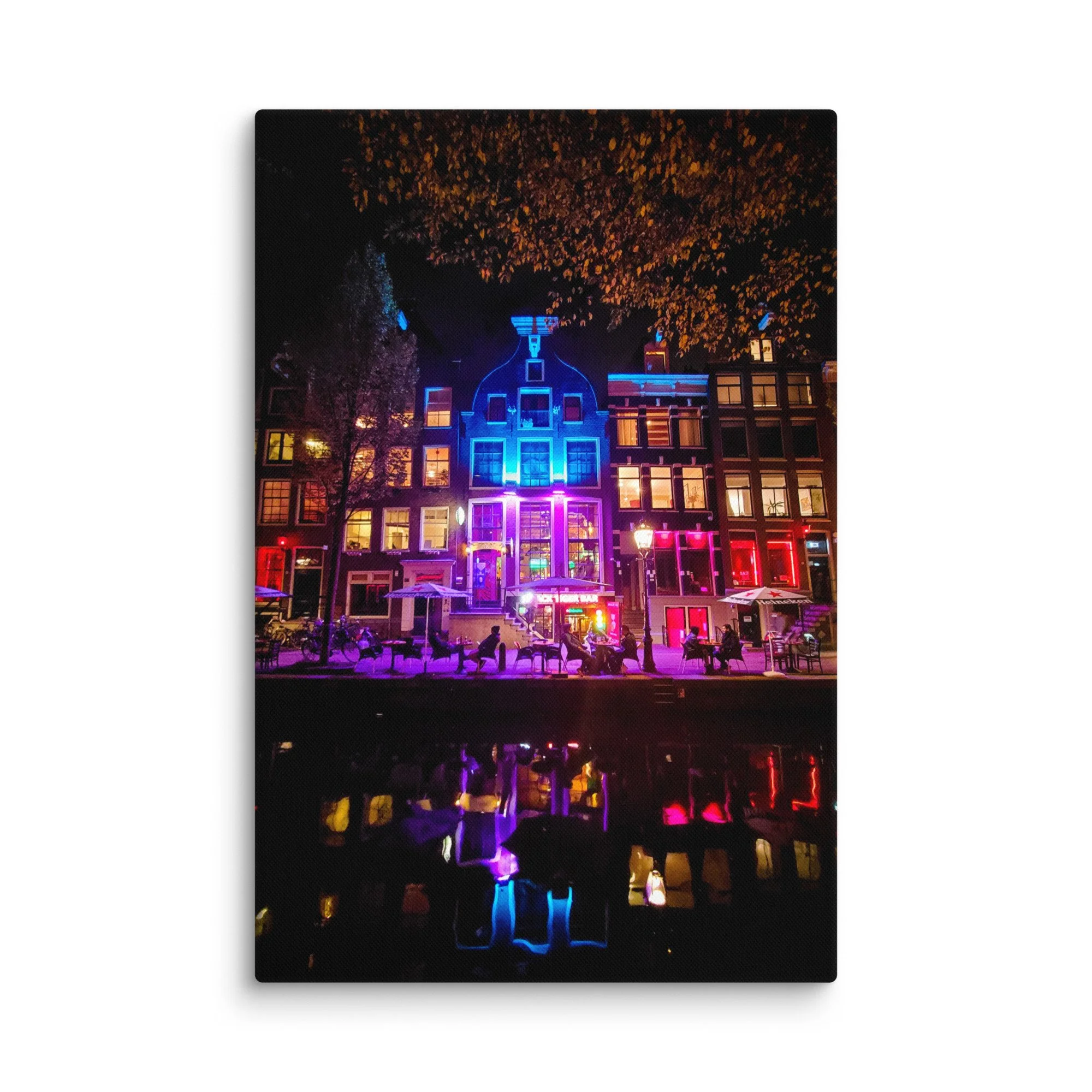 Romantic nighttime Amsterdam canal with blue-purple neon-lit Dick Tiger Bar building reflecting in water – Netherlands city travel photography canvas print wall art decor