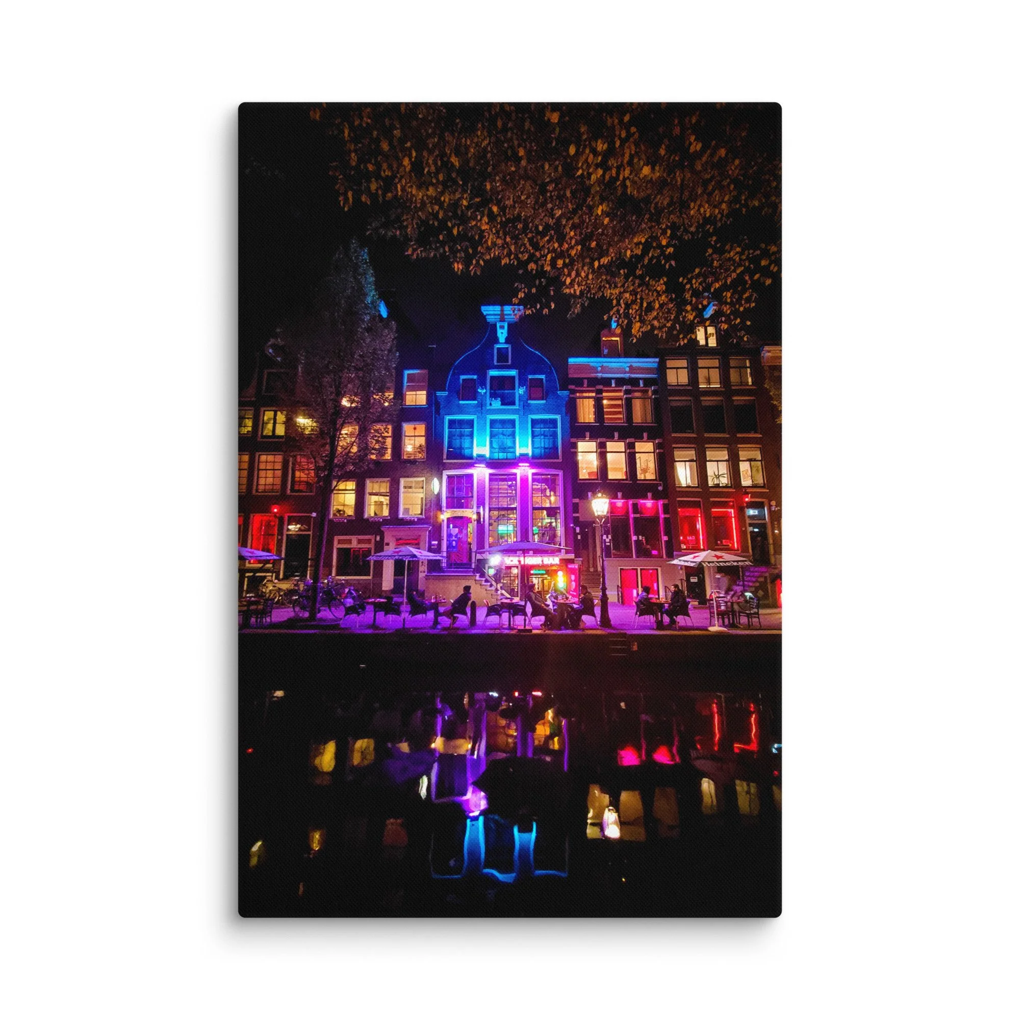 Romantic nighttime Amsterdam canal with blue-purple neon-lit Dick Tiger Bar building reflecting in water – Netherlands city travel photography canvas print wall art decor
