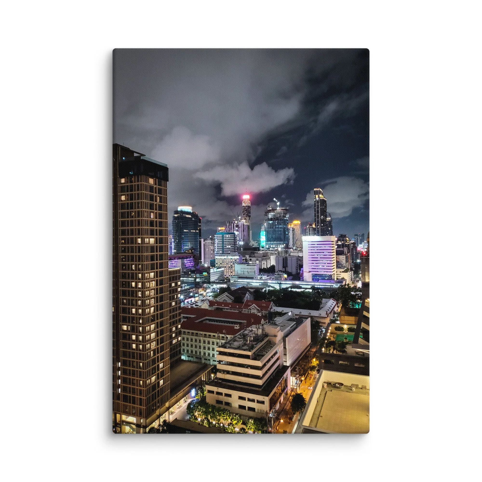 Breathtaking nighttime Bangkok skyline from above with glowing towers, skyscrapers and city lights under cloudy sky – Thailand urban travel photography canvas print wall art decor
